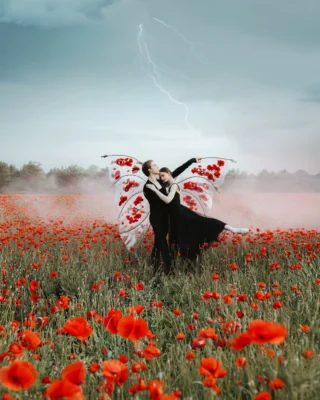 🧚🏼‍♀️What if we protect our love from the voices of people who never even stepped through our door, yet still speak about it?
What if all we truly want is to live — because living also means fighting for what matters.

💃🏻 We chose to dance among flowers and under the rain. Sometimes beauty and pain exist together, close enough to touch, yet never destroying one another.
After every thunderstorm, the fields bloom even brighter because they needed the rain to grow.

Maybe love is the same. 🫂
Maybe we need both the storms and the softness to become stronger.
And that is why we will fight for it and wear our wings of love. 🦋

Photography @jovanarikalo 
Models @katarina_zec @art_makarow_ 
Dress @lacemadeofficial use code jovanarikalo for a discount 
Wings @noakuf 

#creativephotography #artphotoshoot #poppyfield #canoncreator